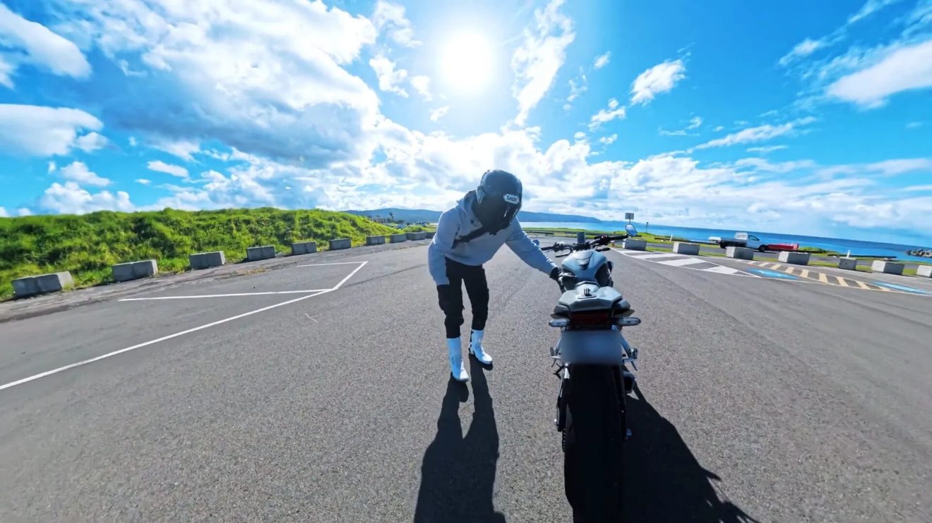 Biker using Insta360 X4 in mountain setting