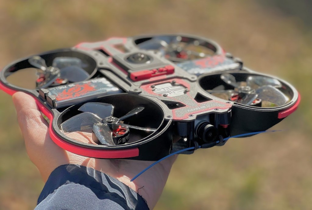 An 360 drone carries a 360 camera and appears invisible to the camera