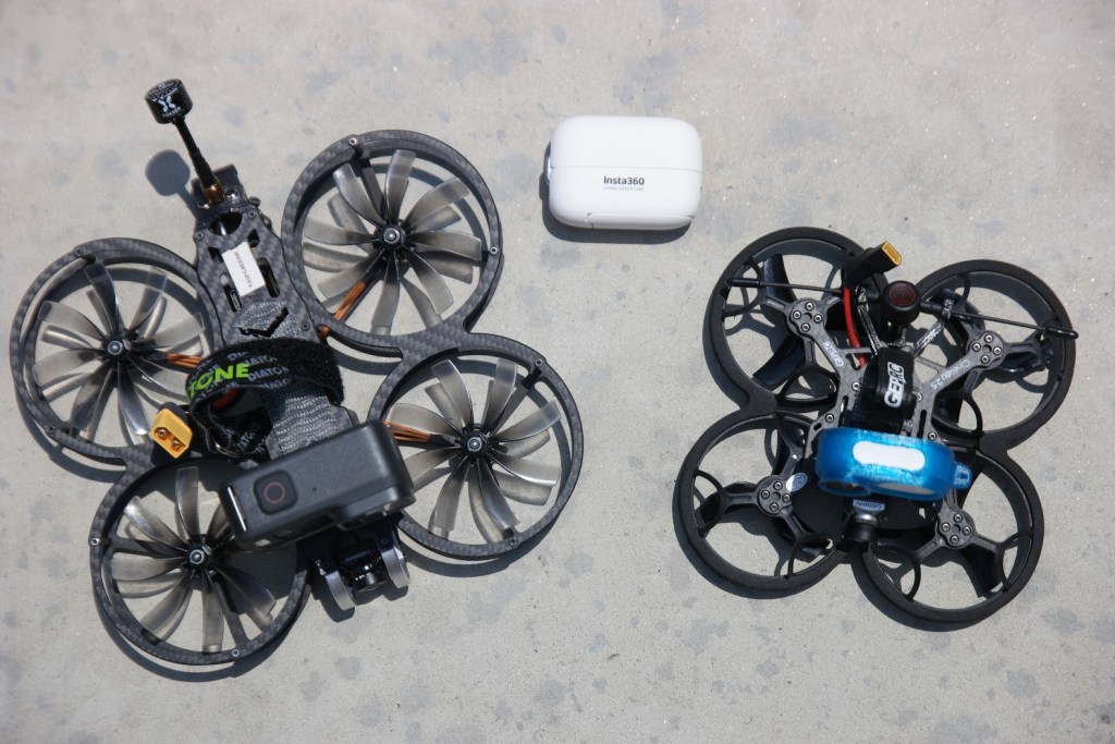 Left to right size comparison: Diatone Taycan, Insta360 Go 2, and Cinelog 25.